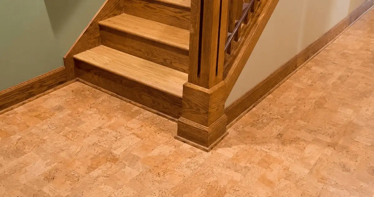 End of a staircase with cork flooring in Tulsa, OK