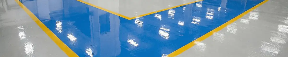 A factory floor professionally covered and marked with epoxy flooring in Tulsa, OK