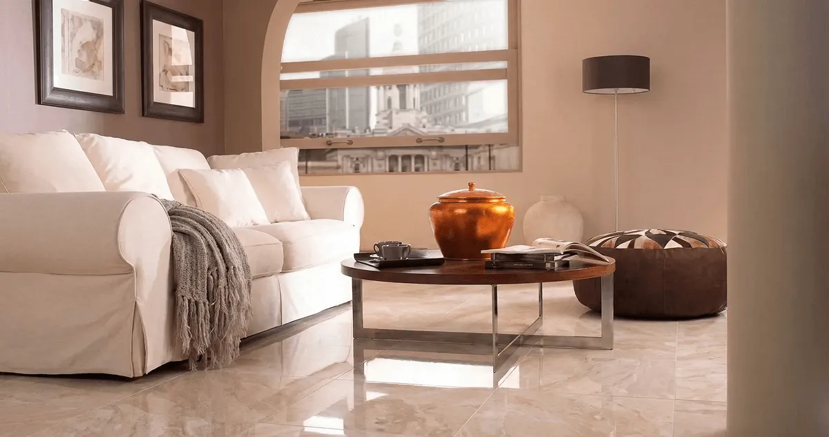 Modern living room with professionally installed marble flooring, a beige sofa, coffee table in Tulsa, OK