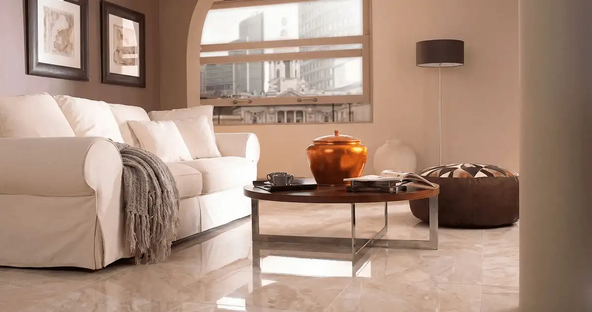 Modern living room with professionally installed marble flooring, a beige sofa, coffee table in Tulsa, OK