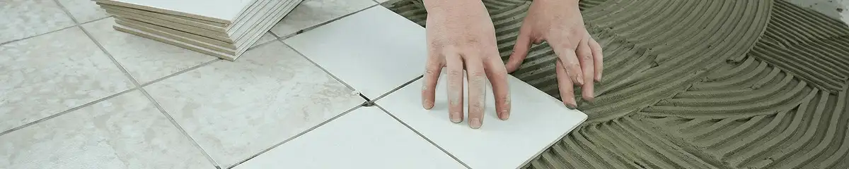 Professional installing white tile floors in Tulsa, OK