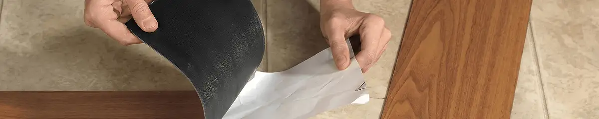 A professional installing vinyl flooring in Tulsa, OK
